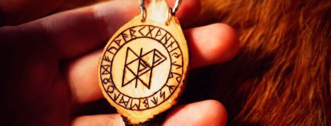 runes on the amulet for luck
